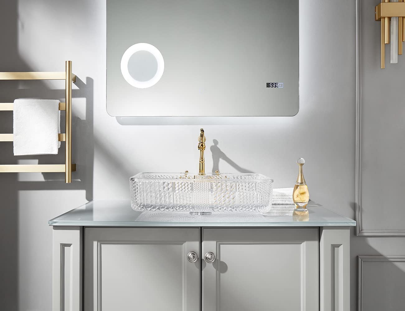 Angled view of transparent crystal-style glass vessel sink highlighting glossy finish and light-refraction facets