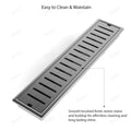 Top-down view of slotted strip pattern grate on brushed stainless steel 18-inch linear shower drain