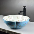Above-counter ceramic vessel sink round 16-inch basin shown with tall vessel faucet (faucet not included)