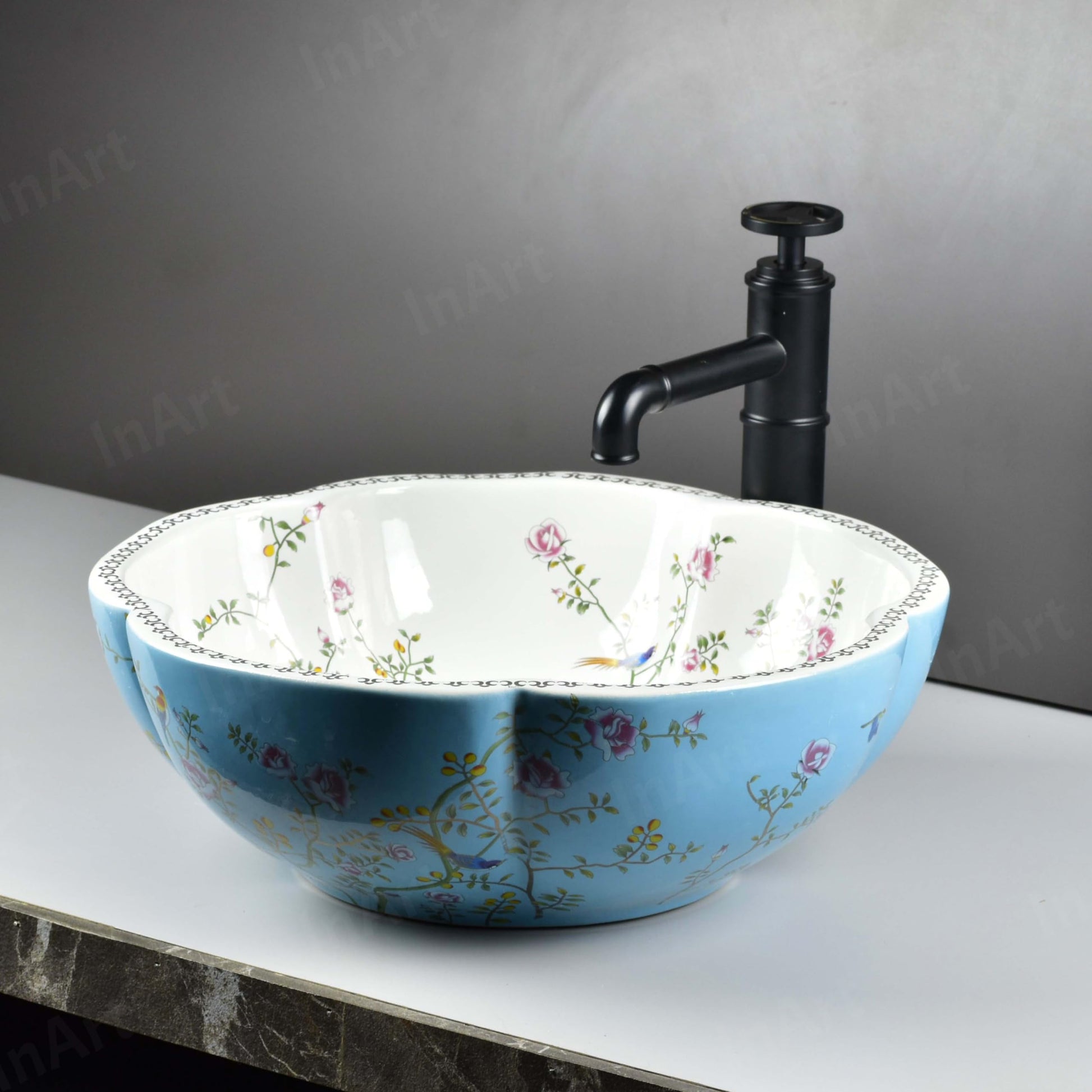 Above-counter ceramic vessel sink round 16-inch basin shown with tall vessel faucet (faucet not included)