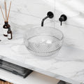 Side profile of clear crystal-look glass round vessel sink showing raised above-counter height