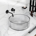 Round clear tempered glass vessel sink bowl with ribbed fluted sides, above-counter bathroom sink