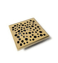 Antique brass square floor drain with removable brass grate and thin perimeter frame