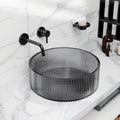 Round tempered glass vessel sink in smoked gray with fluted texture, above-counter bathroom basin