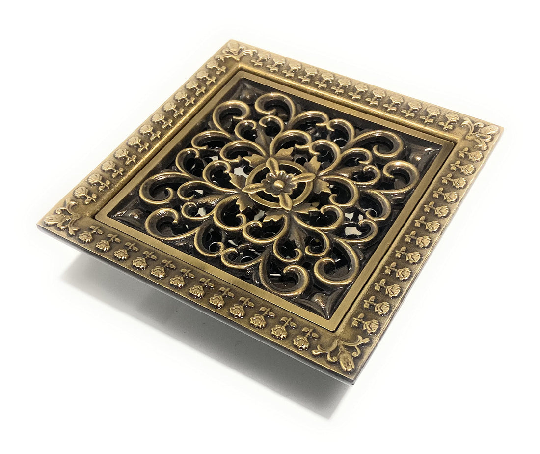 Square shower drain cover, solid brass with antique brass finish, 4 inch outlet top view