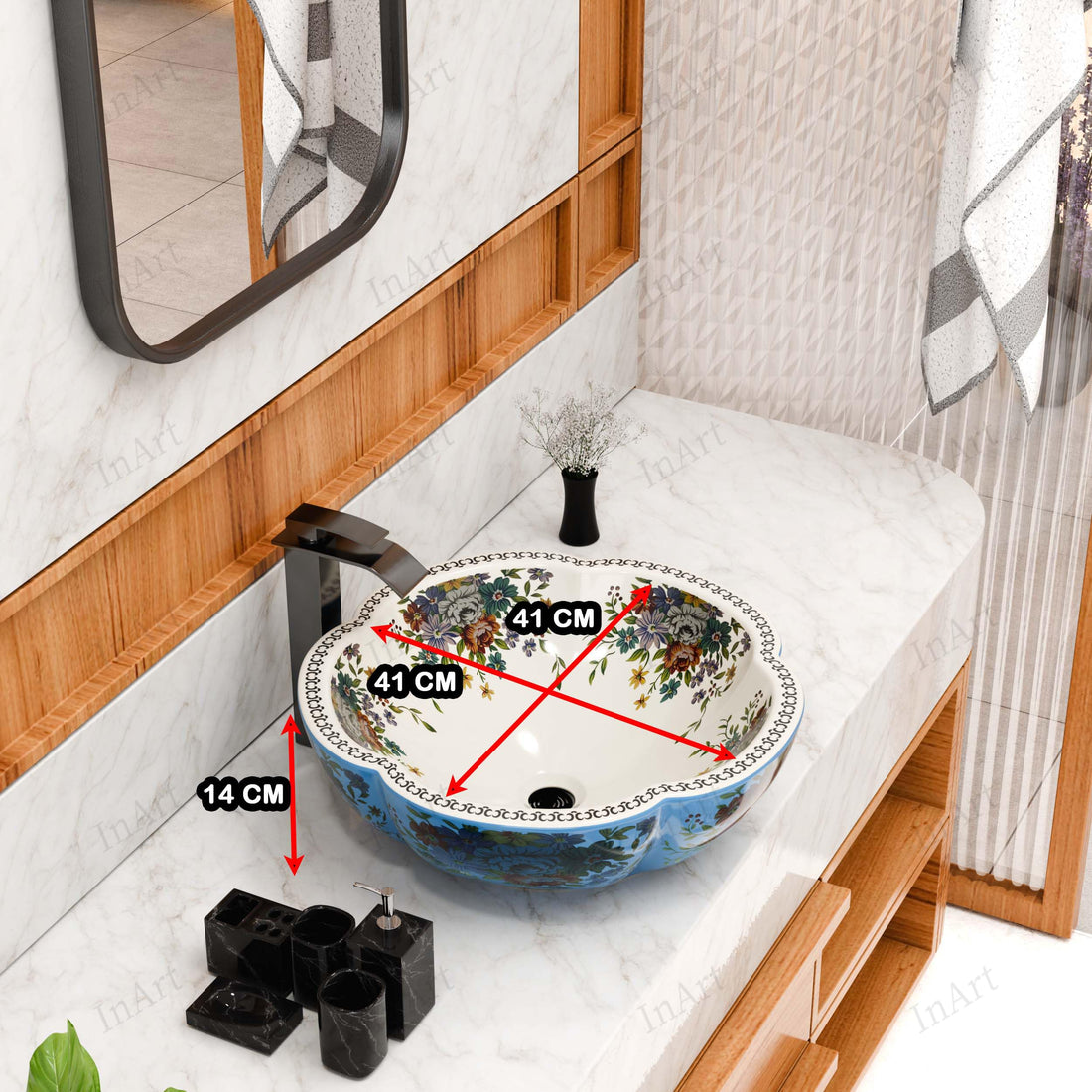 Round glazed ceramic vessel sink bowl with blue floral exterior and white patterned interior, above-counter bathroom basin