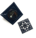 InArt square shower drain cover removed showing internal trap seal insert for odor blocking