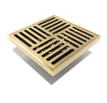 InArt antique brass square floor drain grate lifted off showing clean-out access maintenance view