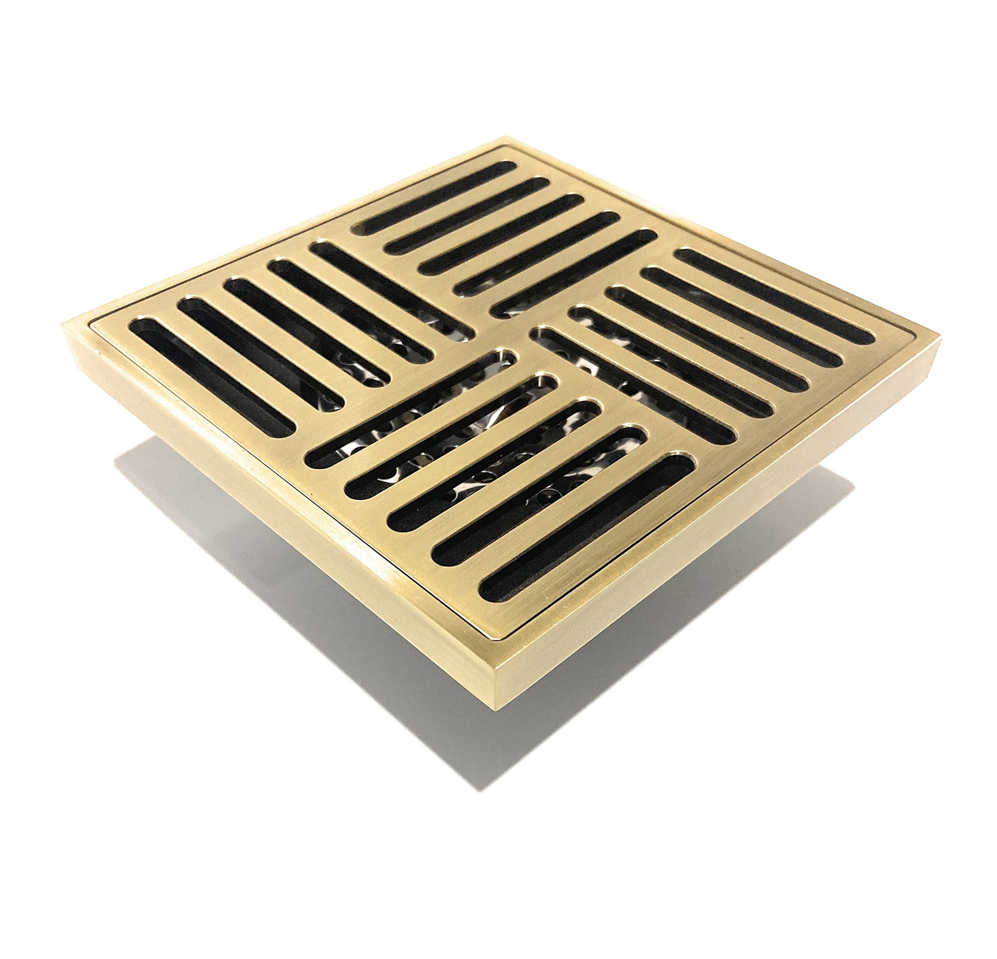 InArt antique brass square floor drain grate lifted off showing clean-out access maintenance view