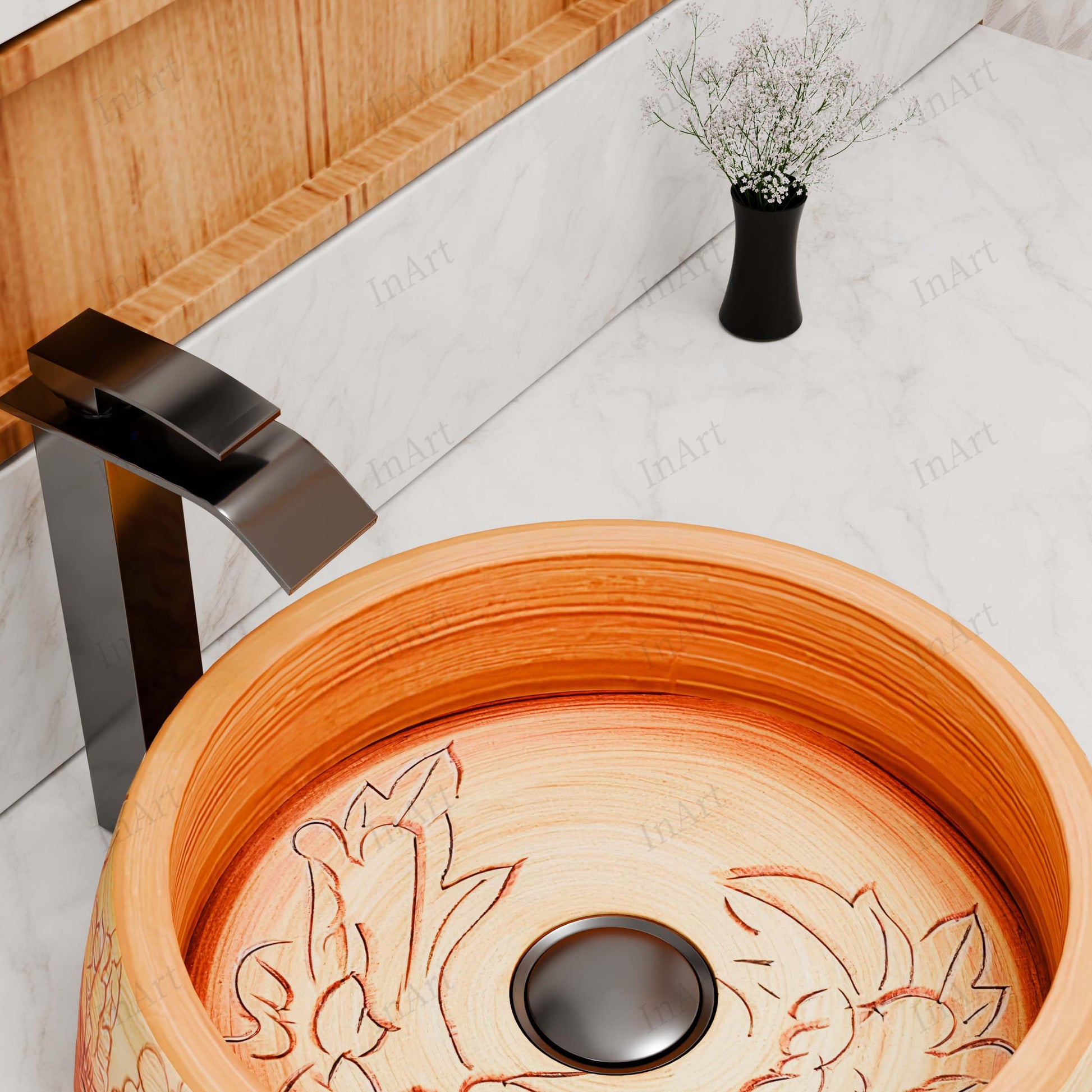 Bathroom vanity countertop styling with round ceramic vessel sink, wood-tone floral decorative basin