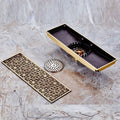 Linear shower drain body showing removable strainer and odor trap insert, antique brass brass