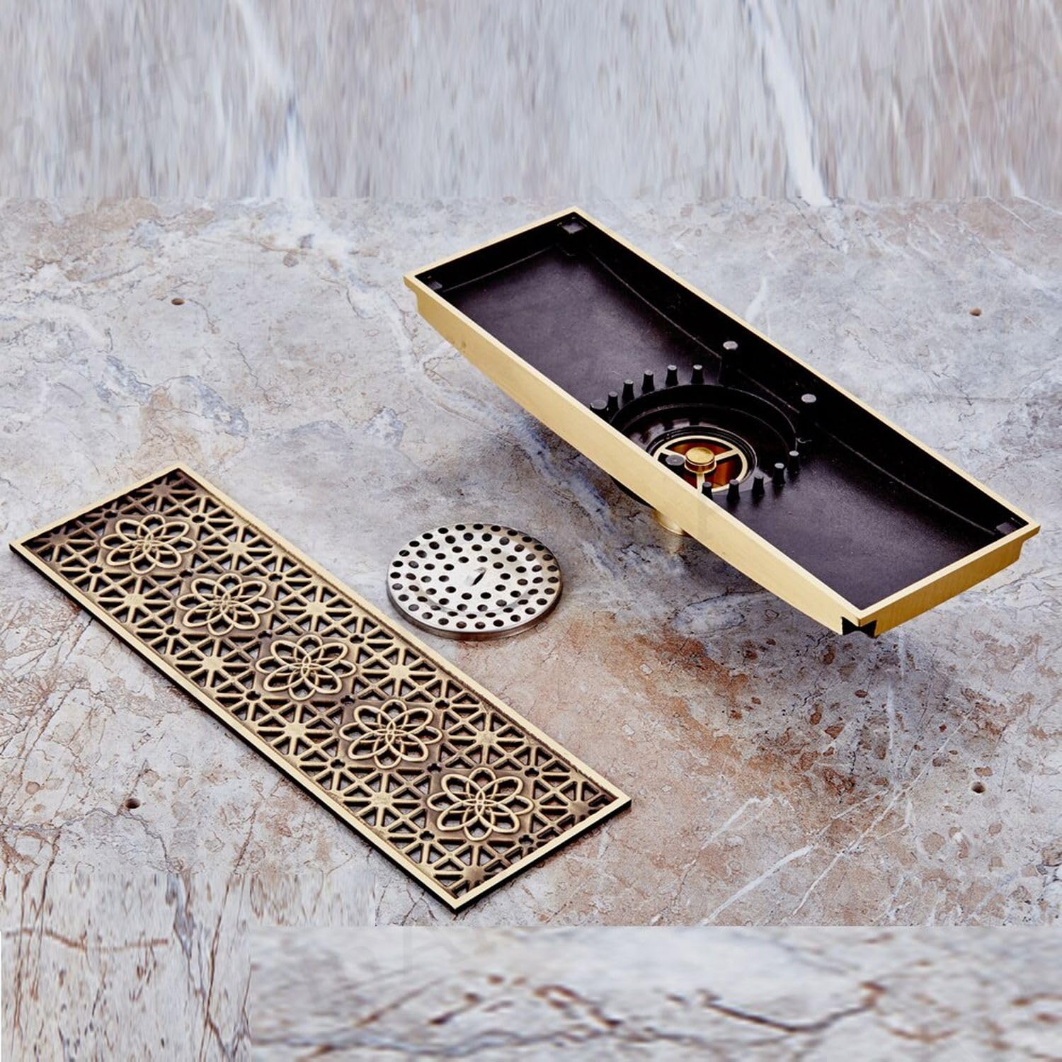 Linear shower drain body showing removable strainer and odor trap insert, antique brass brass