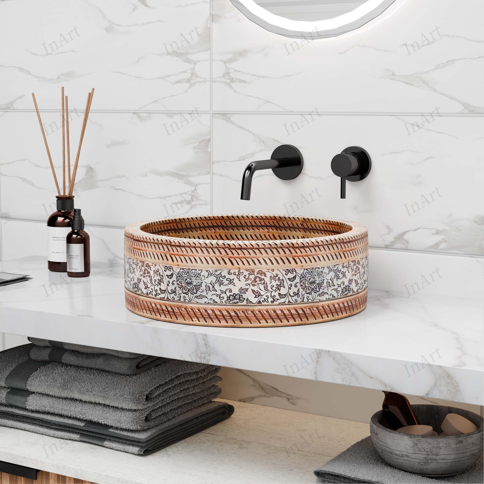 Interior detail of patterned ceramic round vessel sink with center drain opening (no overflow)