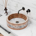 Round glazed ceramic vessel sink with Moroccan floral pattern, above-counter bathroom basin