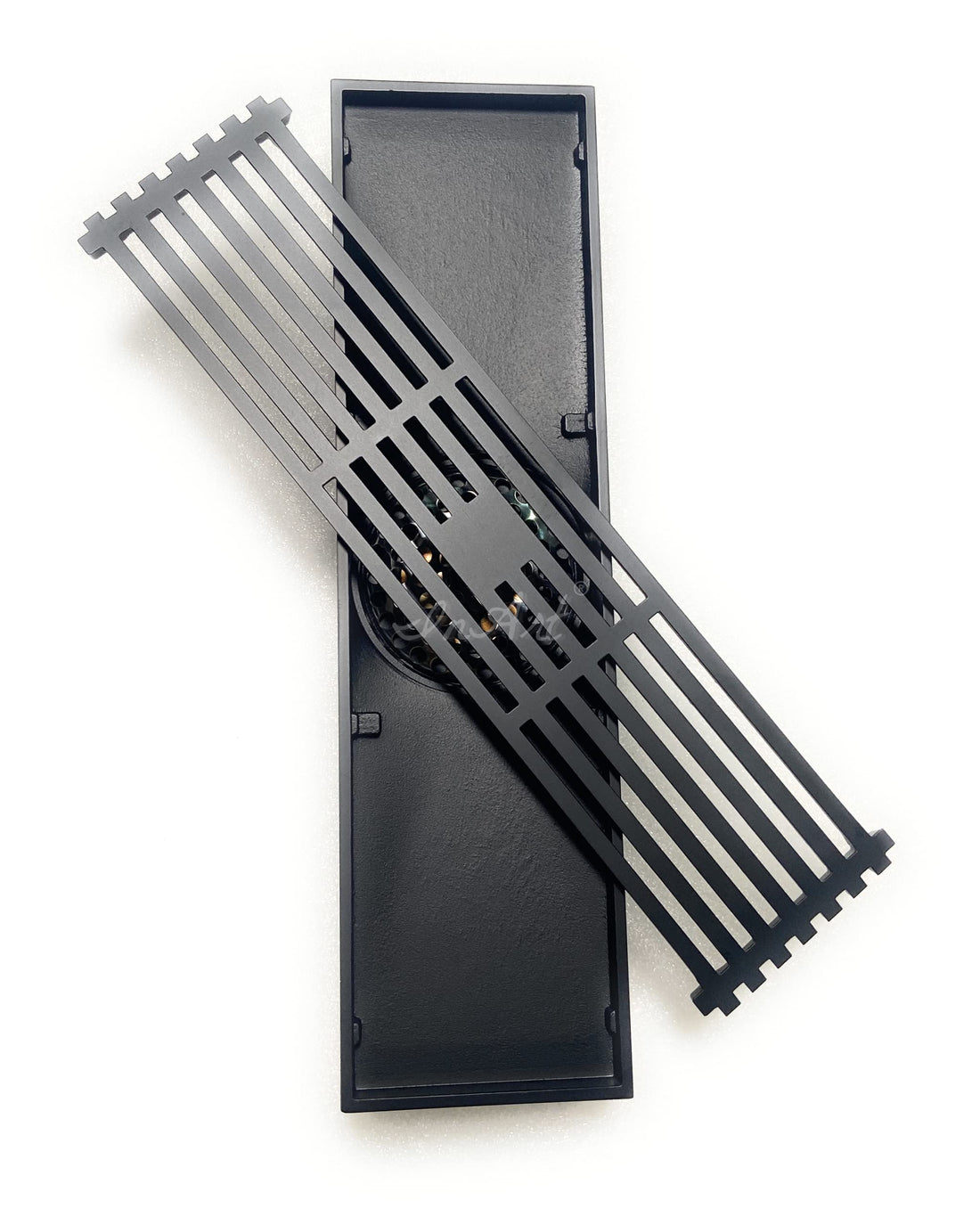 Matte black brass linear shower floor drain with slotted grate cover, rectangular center outlet