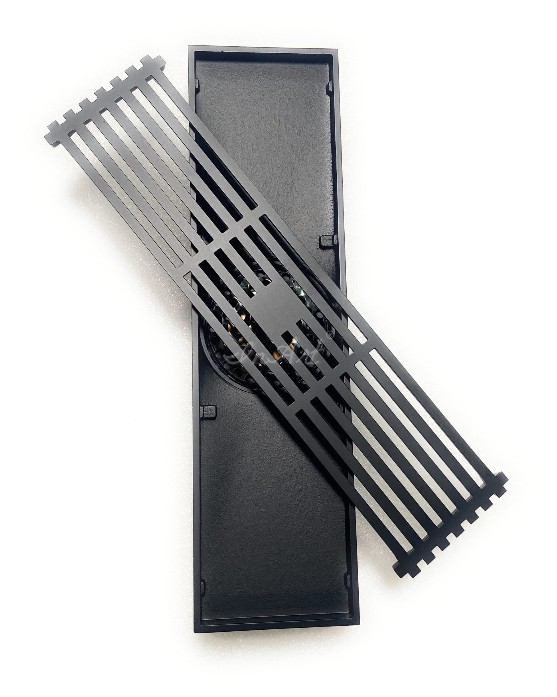 Matte black brass linear shower floor drain with slotted grate cover, rectangular center outlet