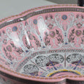 Side profile of round ceramic vessel sink showing 5.5-inch bowl depth and scalloped edge, glossy pink finish