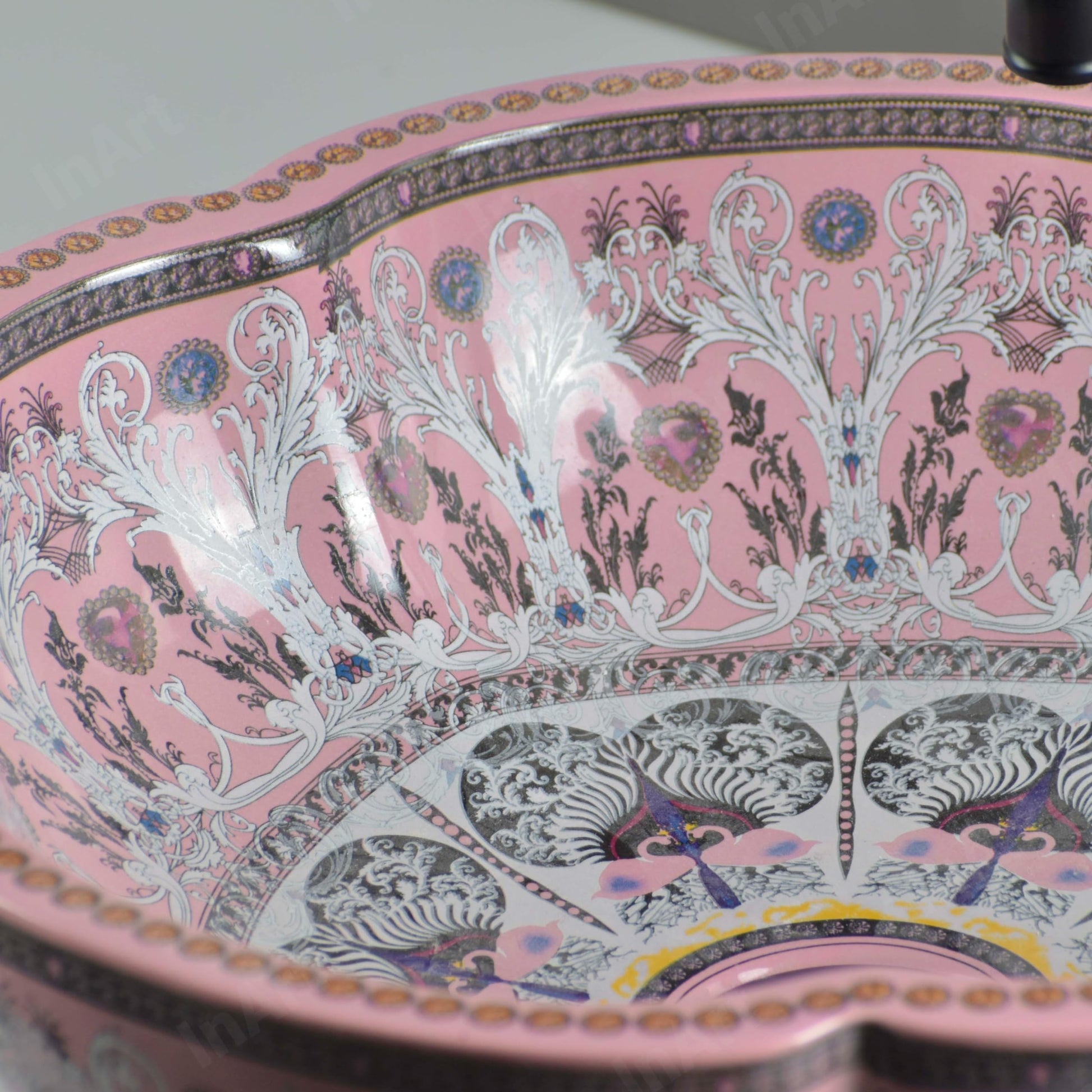 Side profile of round ceramic vessel sink showing 5.5-inch bowl depth and scalloped edge, glossy pink finish